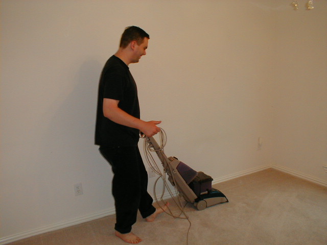 [Greg shampooing his carpet]